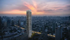 Noble Form Thonglor luxury high-rise condominium exterior towering over the Bangkok skyline at sunset on Sukhumvit 55