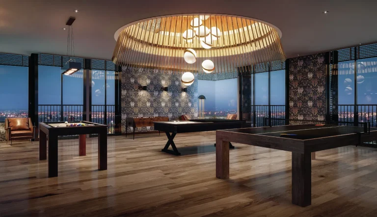 Noble Form Thonglor luxury condo 37th-floor recreation room featuring a pool table, table tennis, and panoramic nighttime city views on Sukhumvit 55 Bangkok