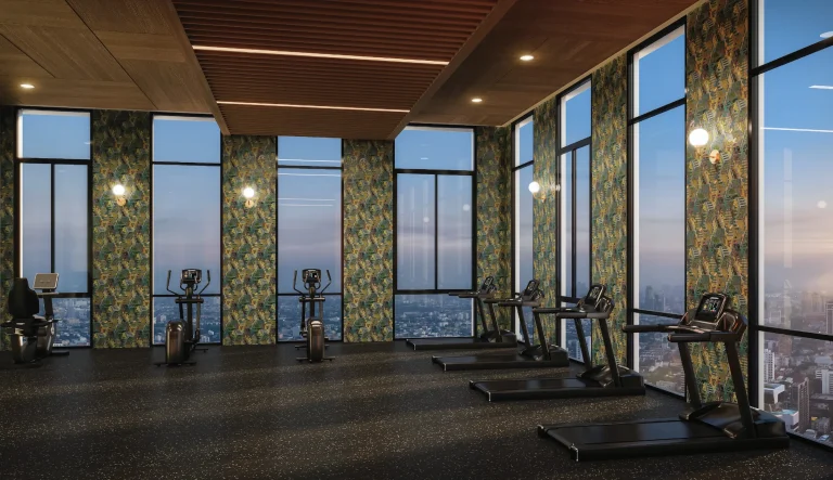 Noble Form Thonglor luxury condo 45th-floor Cloud Gym featuring modern treadmills, stationary bikes, and panoramic floor-to-ceiling city views on Sukhumvit 55 Bangkok
